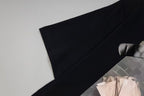 Black Givenchy T-shirt sleeve and front print detail