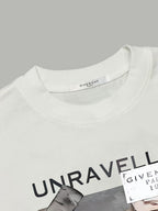 White T-shirt neckline with black UNRAVELLED graphic detail