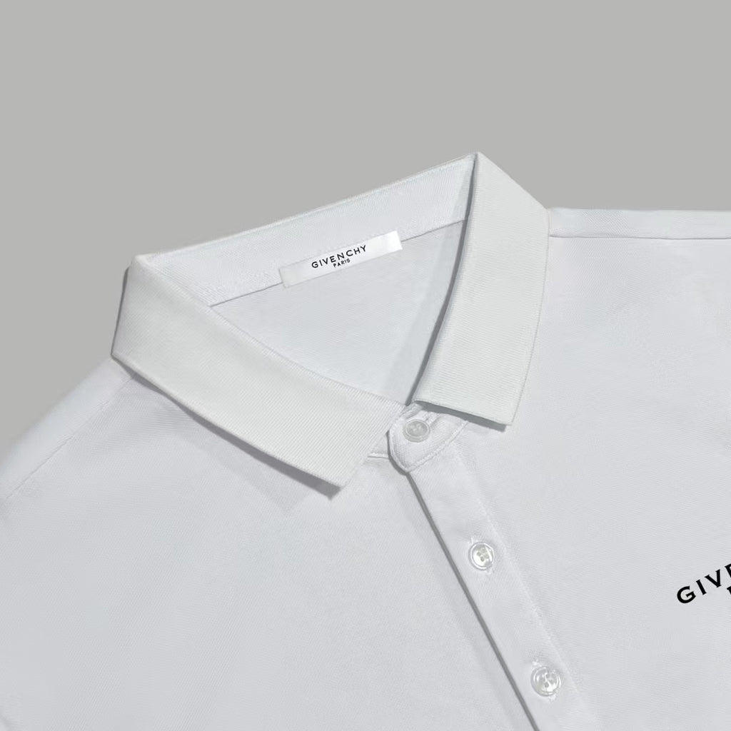 White polo shirt close-up with collar, button placket, and chest logo