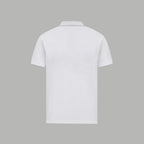 Back view of white polo shirt with collar and short sleeves