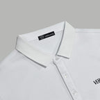 White polo shirt collar and button placket with Versace logo detail