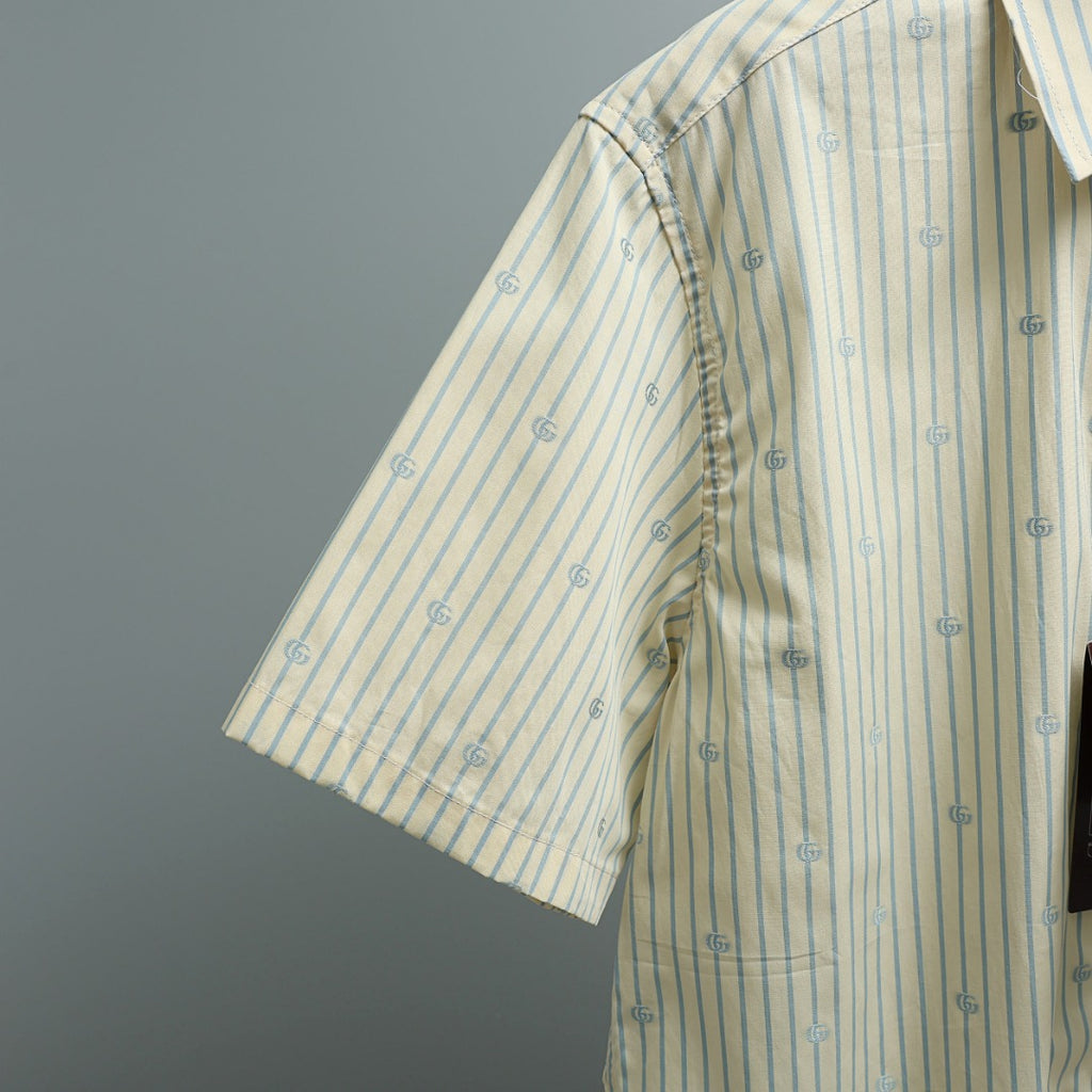 Light blue striped short-sleeve shirt sleeve with GG logo pattern