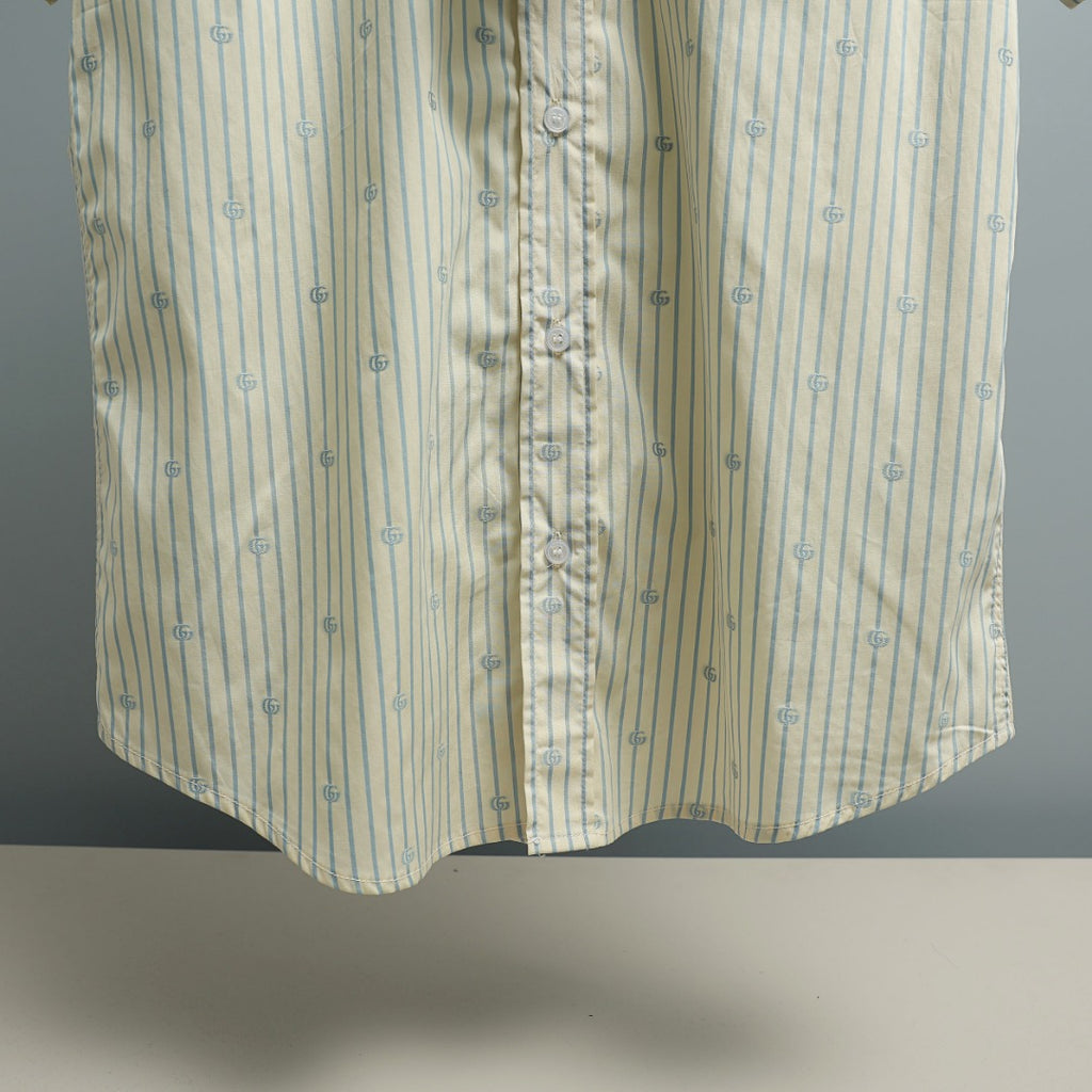 Light blue striped short-sleeve shirt front with buttons and GG logos