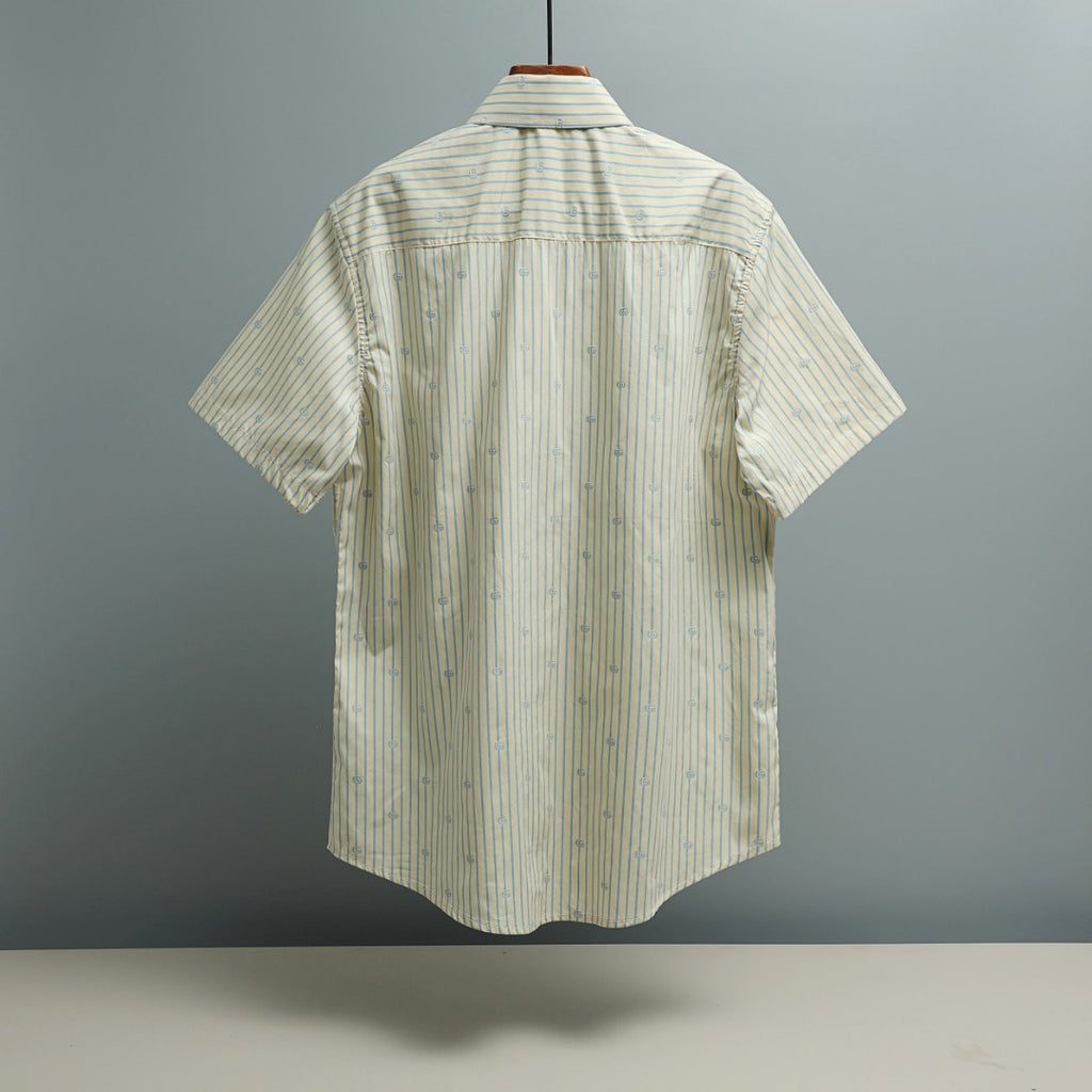 Light blue striped short-sleeve shirt back view with GG logo pattern