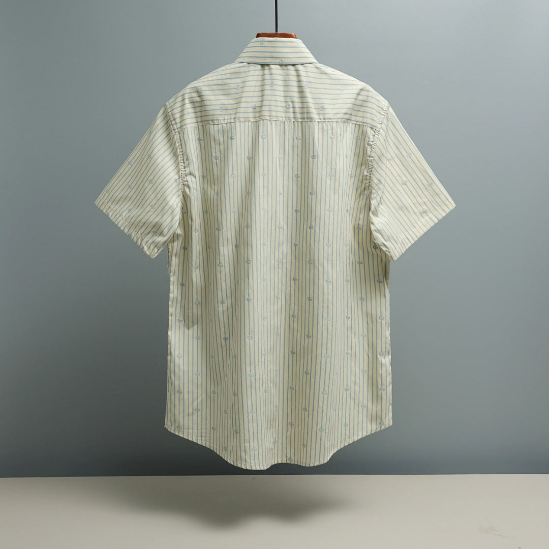 Light blue striped short-sleeve shirt back view with GG logo pattern
