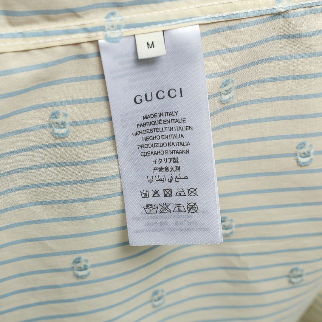 Striped shirt size and care label at interior neck