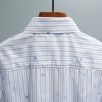 Gucci striped button-up shirt with collar and blue logo buttons, back view