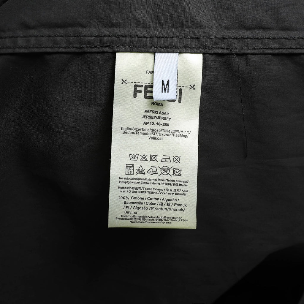 Black Fendi shorts with interior size and care label