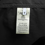 Black Fendi shorts with interior size and care label