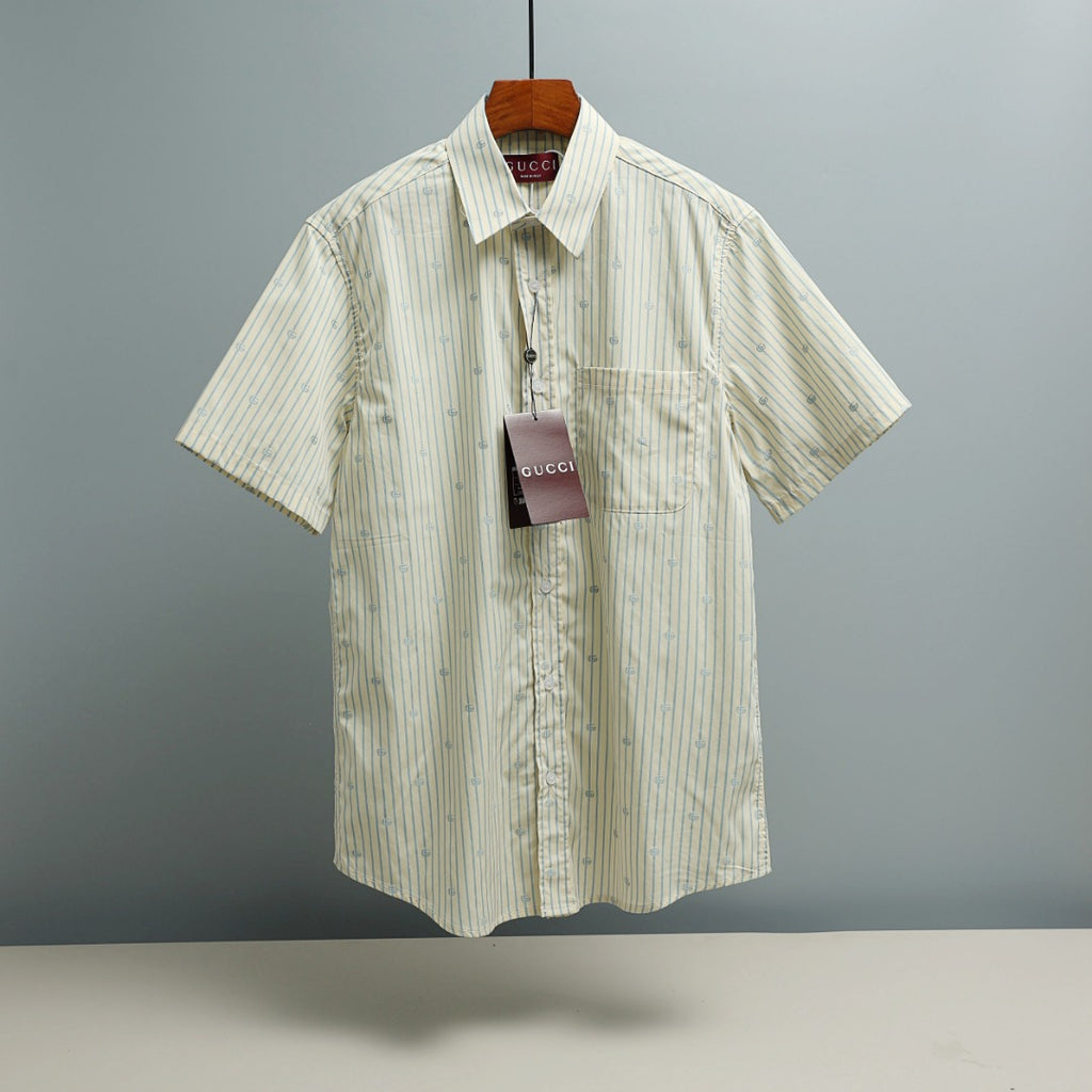 Light blue striped short-sleeve button-up shirt with small GG logo pattern