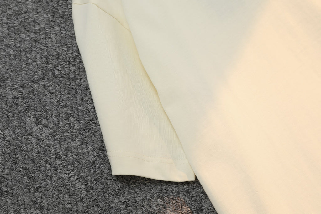 Cream long sleeve T-shirt side view with smooth fabric