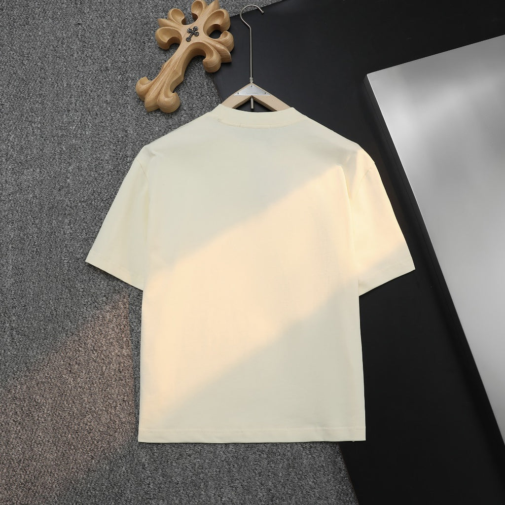 Cream Gucci T-shirt hanging on a wooden hanger, back view.