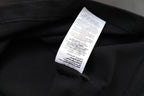 Black Gucci T-shirt interior care tag label near collar