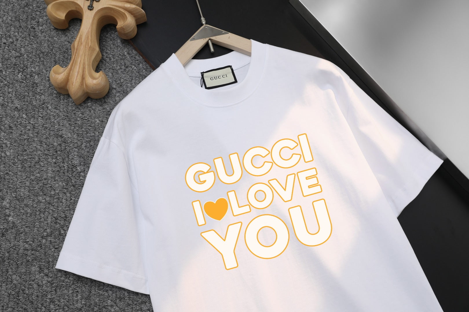 White Gucci T-shirt front with "GUCCI I LOVE YOU" heart text graphic