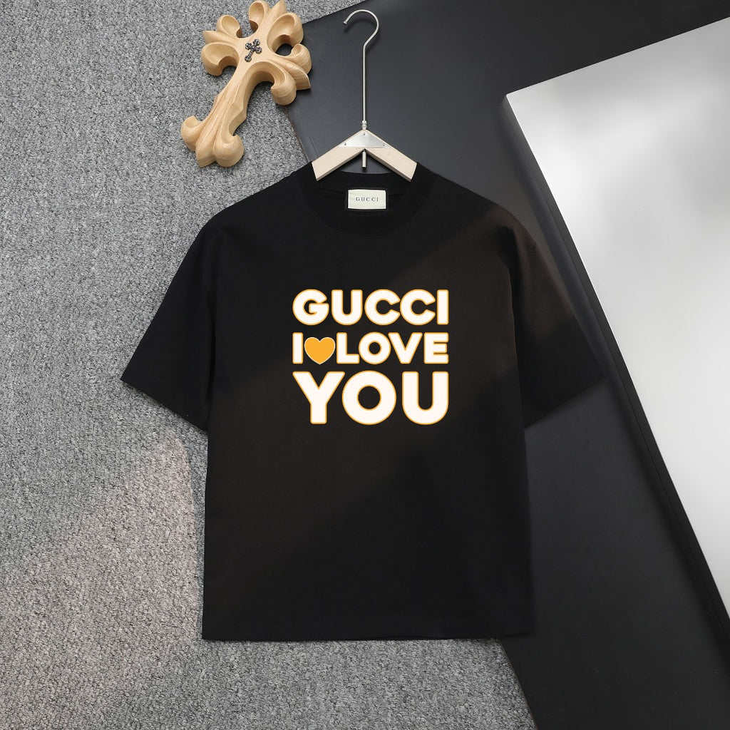 Black Gucci T-shirt with large yellow “GUCCI I LOVE YOU” print