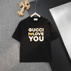 Black Gucci T-shirt with large yellow “GUCCI I LOVE YOU” print