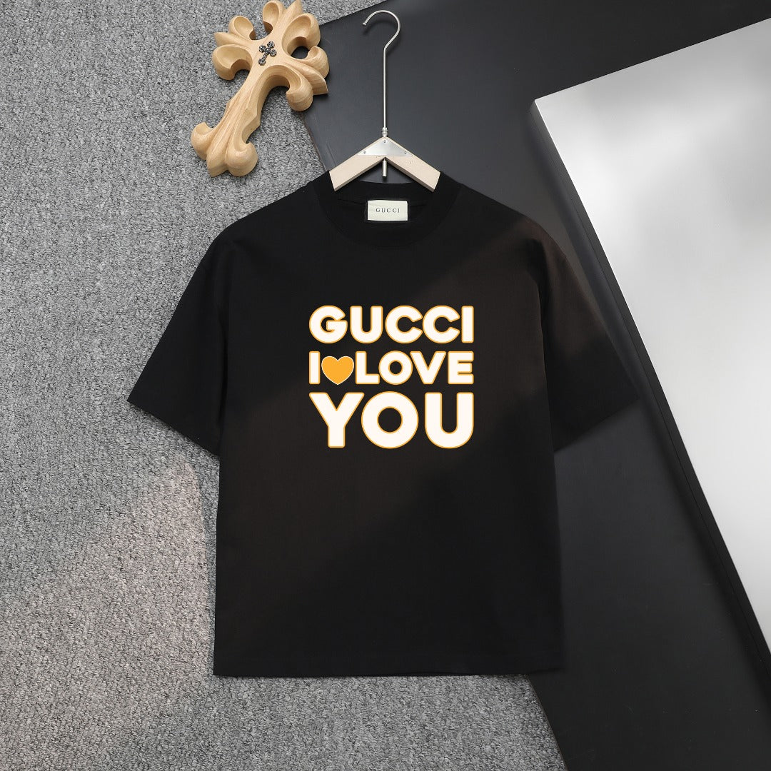 Black Gucci T-shirt with large yellow “GUCCI I LOVE YOU” print