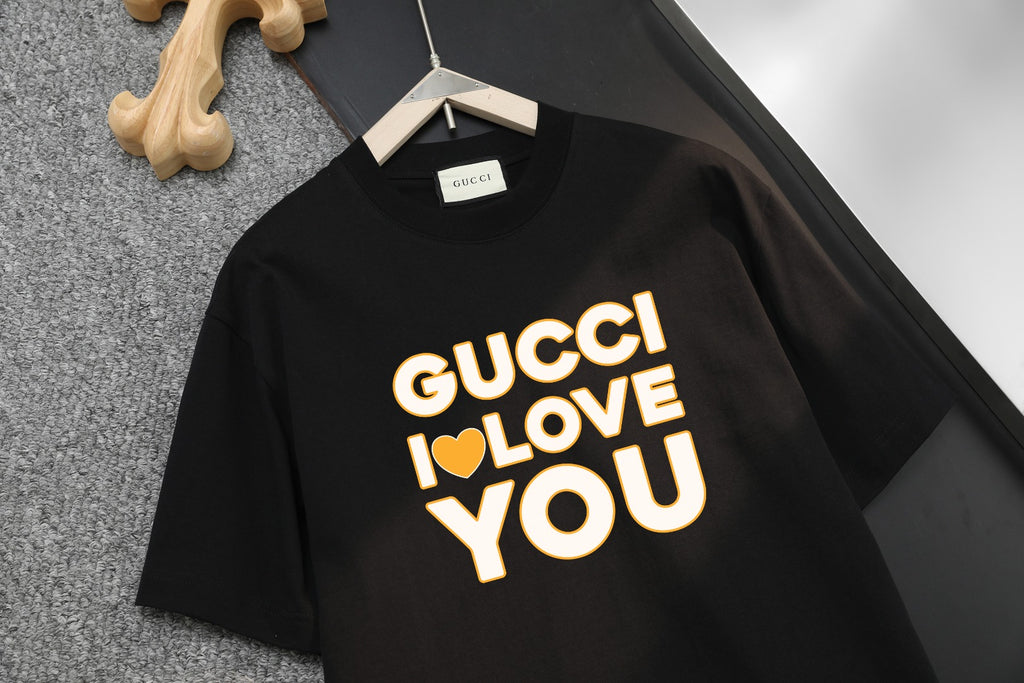 Black Gucci T-shirt with yellow “GUCCI I LOVE YOU” graphic on chest