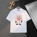 White T-shirt with cartoon bear Gucci graphic on the front