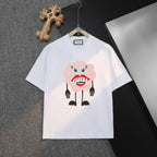 White T-shirt with cartoon bear Gucci graphic on the front
