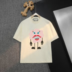Cream T-shirt with cartoon bear face Gucci graphic