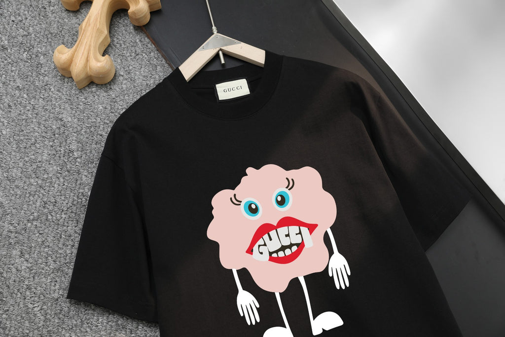 Black short-sleeve T-shirt featuring large pink character graphic at chest