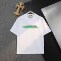 White short-sleeve T-shirt with green logo graphic on chest, Gucci label at collar