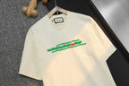 Gucci cream T-shirt with green and red script-style front logo