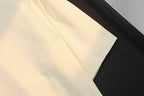 Gucci cream T-shirt sleeve and side seam close-up