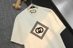 Cream Gucci T-shirt with GG diamond logo, close-up front view