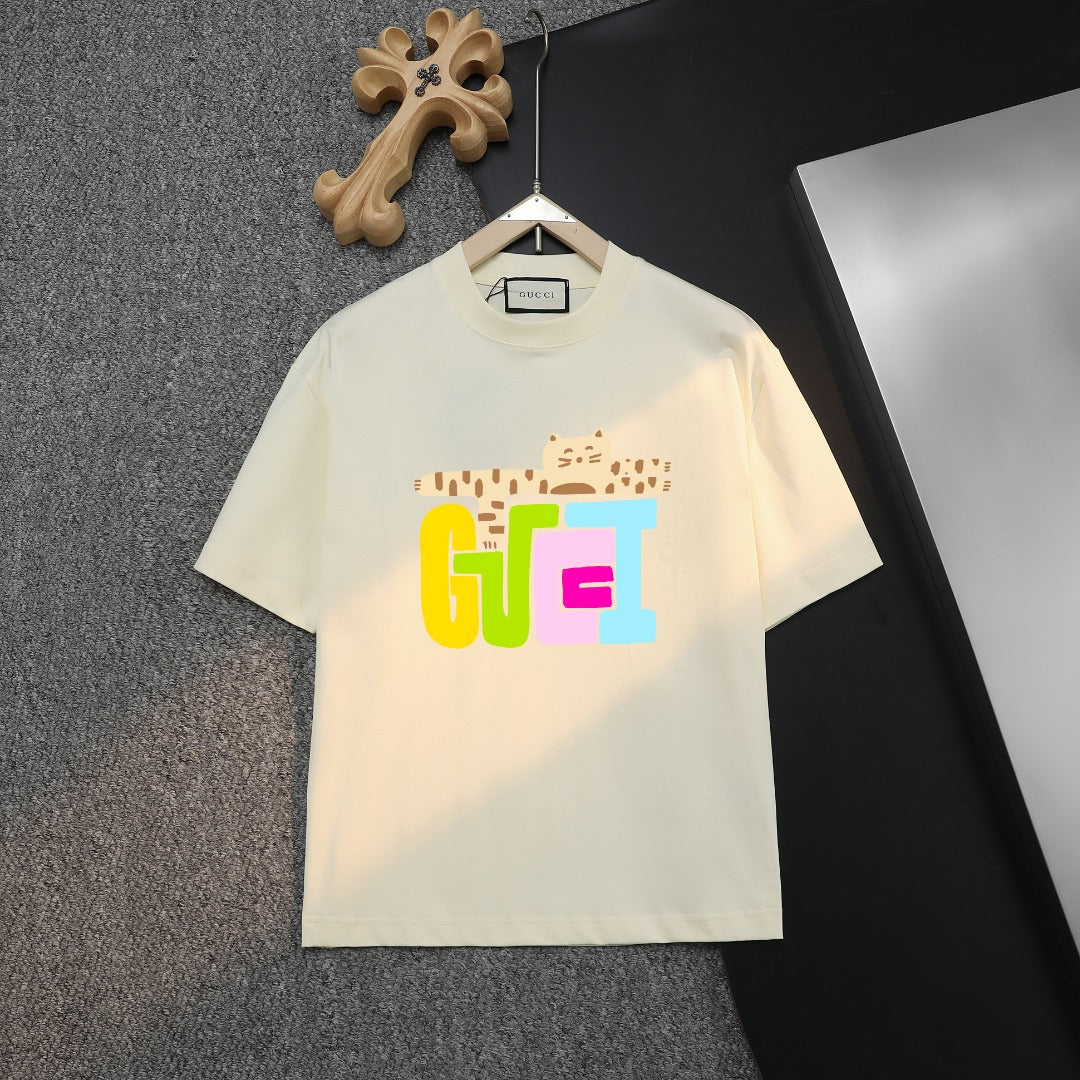 Cream short-sleeve T-shirt with multicolor “GGE” graphic on the front