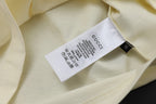Cream short-sleeve T-shirt with care label inside neckline
