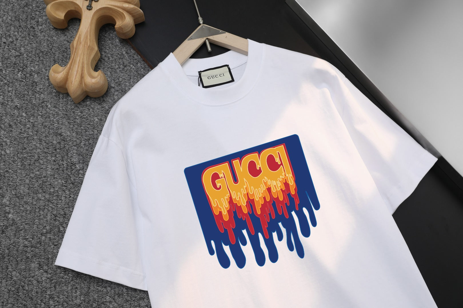 White Gucci T-shirt with blue and red logo graphic on front