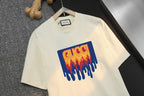 Cream short-sleeve T-shirt with large multicolor logo print on front