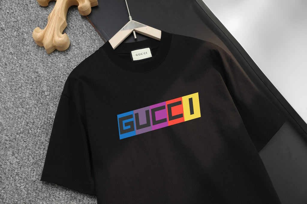 Black Gucci T-shirt with multicolor Gucci logo graphic