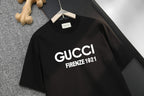 Front of black short-sleeve T-shirt with GUCCI and FIRENZE 1921 text