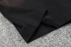 Black T-shirt fabric fold and stitched hem