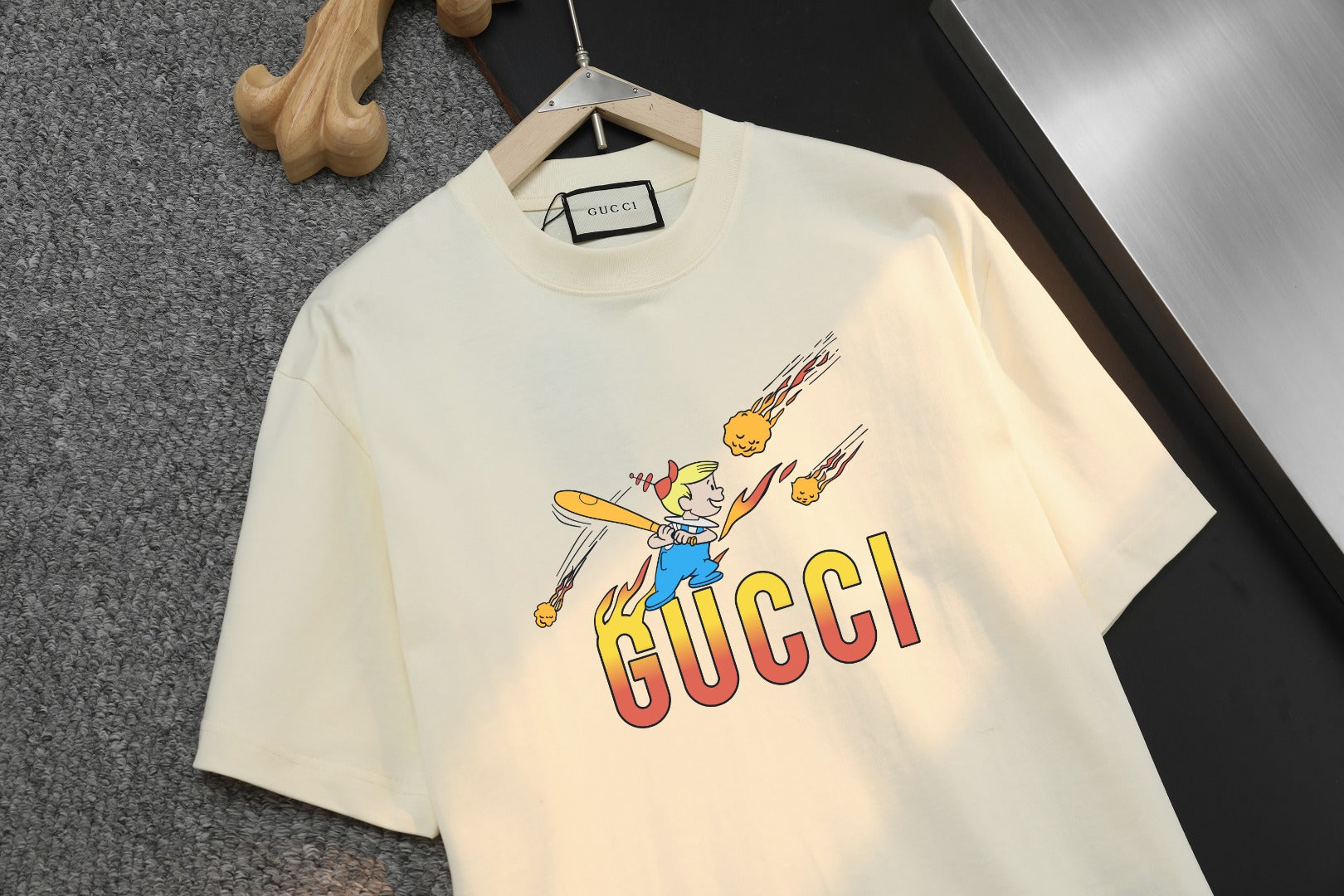 Light cream short-sleeve T-shirt with Gucci logo and cartoon graphic detail