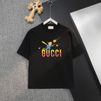 Black Gucci T-shirt with cartoon rider and 'GUCCI' logo print