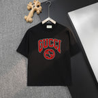 Black T-shirt with GUCCI logo graphic in red and green on the chest