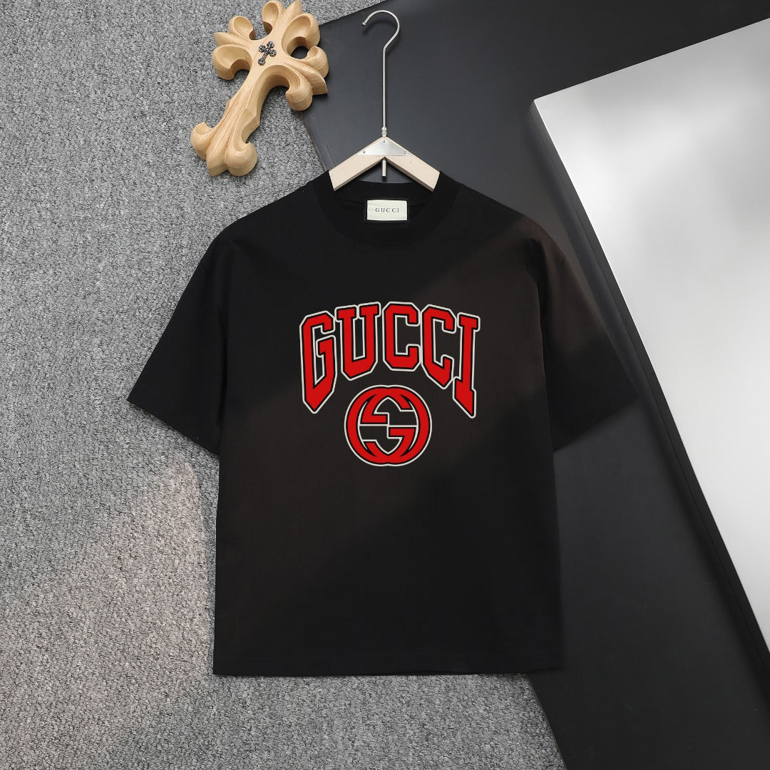 Black T-shirt with GUCCI logo graphic in red and green on the chest