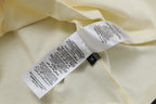 Cream Gucci T-shirt care label and size tag inside neckline.