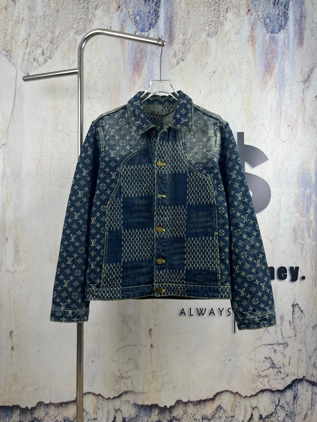 Monogram denim jacket with blue patchwork front and gold button placket
