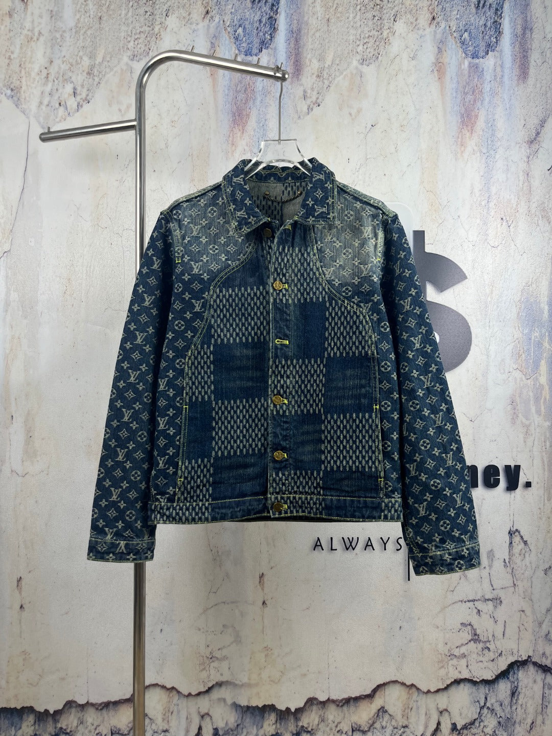 Monogram denim jacket with blue patchwork front and gold button placket
