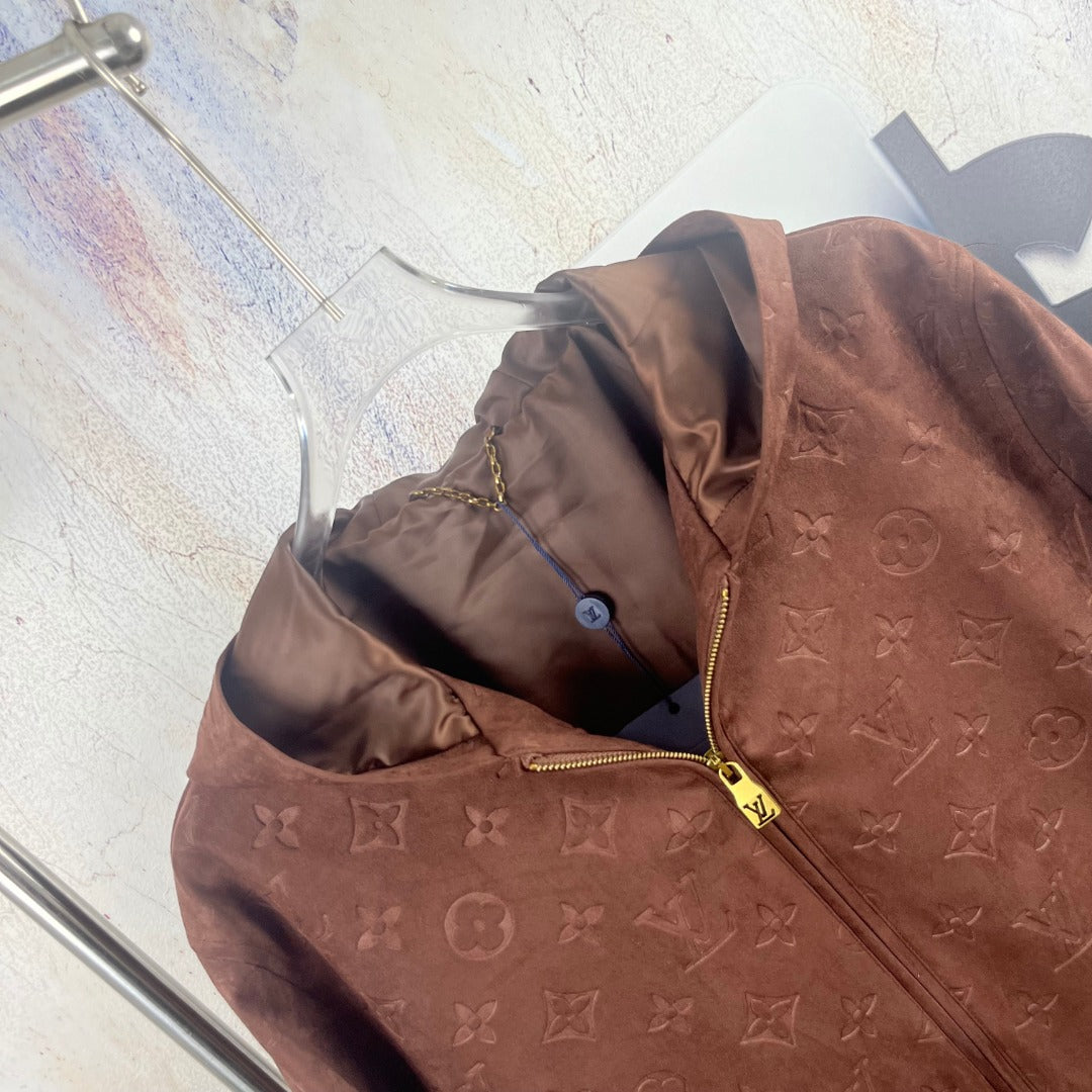 Brown monogram hooded jacket with front zipper and gold-tone hardware