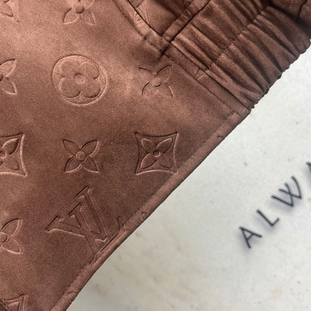 Brown monogram jacket sleeve detail with ribbed cuff