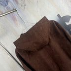 Brown monogram hooded jacket back panel close-up