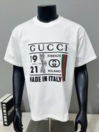 Gucci white crewneck T-shirt full front view with logo graphic on chest