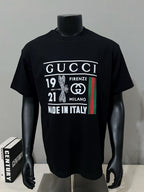 Black graphic T-shirt on mannequin with Gucci Firenze Milano print