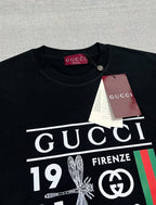 Black Gucci graphic T-shirt neckline with tag attached
